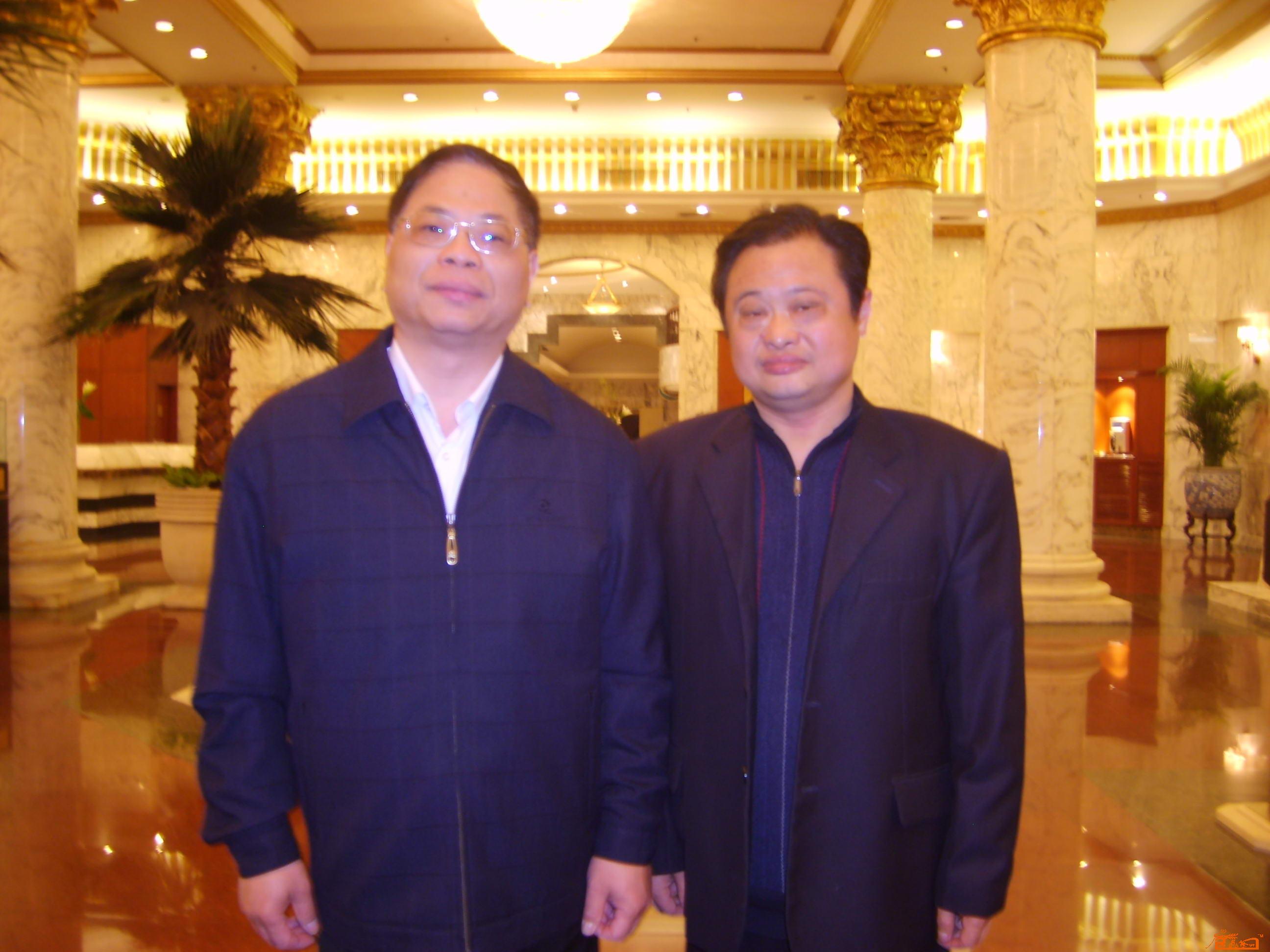 中央委员、中国残联党组书记、理事长王新宪与詹东升合影留念